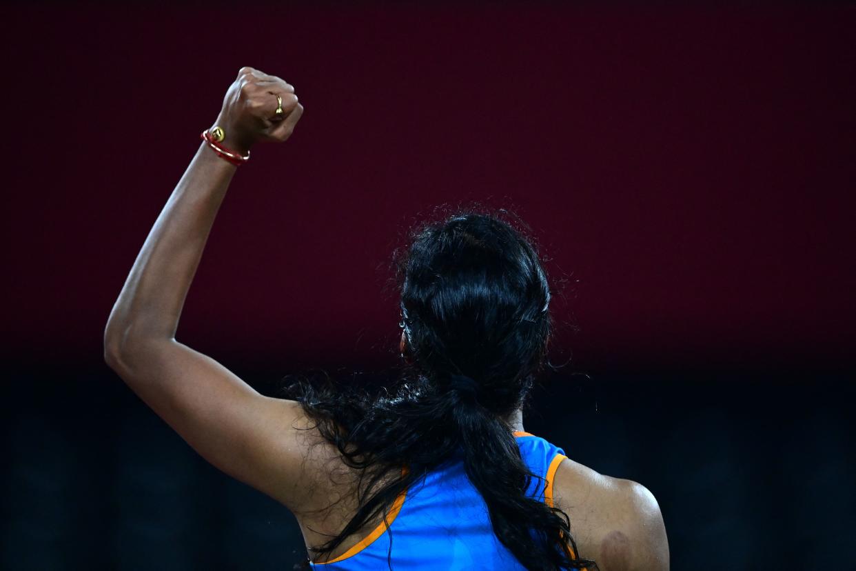 India's P. V. Sindhu reacts after a point against China's He Bingjiao in their women's singles badminton bronze medal match during the Tokyo 2020 Olympic Games at the Musashino Forest Sports Plaza in Tokyo on August 1, 2021. (Photo by Pedro PARDO / AFP) (Photo by PEDRO PARDO/AFP via Getty Images)