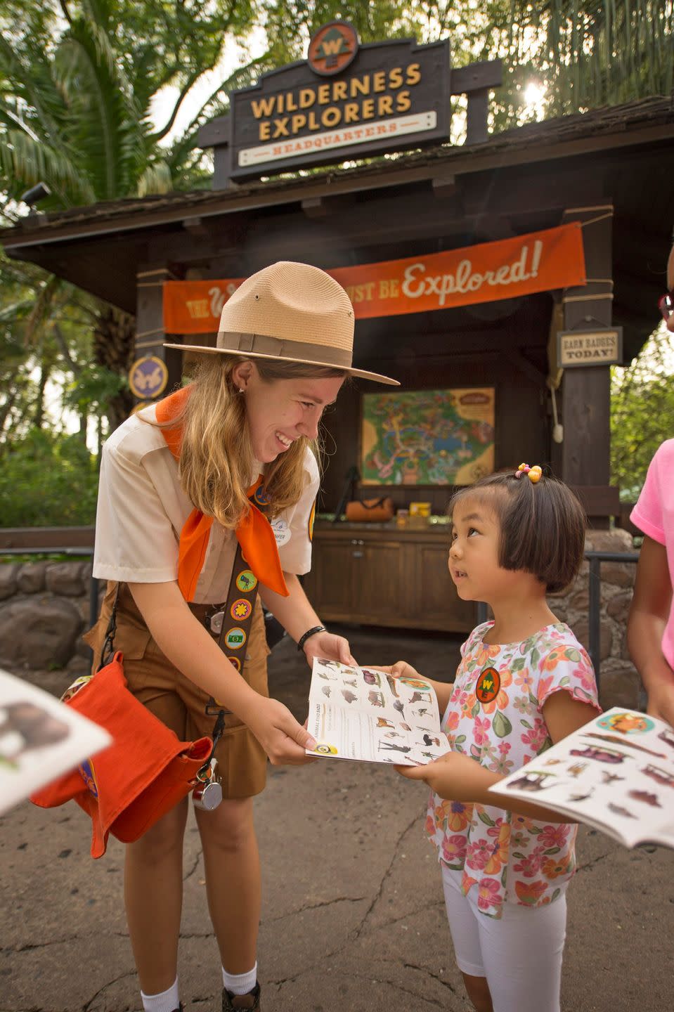 disneys animal kingdom guests become wilderness explorers in an all new self guided experience aimed at deepening their understanding of animals and the natural world we live in inspired by russell, the wilderness explorer in the disney pixar film up park guests can earn approximately 30 sticker badges in adventures exploring the theme park, completing various activities and solving puzzles along the way topics include everything from studying the animal inhabitants of the park to learning animal nutrition to combing through a dig site and identifying fossils headquartered on oasis bridge, wilderness explorers is included in disneys animal kingdom admission disneys animal kingdom is located at walt disney world resort in lake buena vista, fla kent phillips, photographer