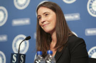 Catie Griggs is introduced as the Seattle Mariners' new president of business operations during a baseball a press conference on Wednesday, July 28, 2021, (AP Photo/Jason Redmond)