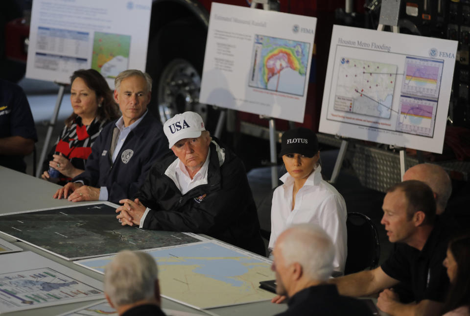 The president and first lady&nbsp;receive a briefing on Tropical Storm Harvey relief efforts with Texas Gov.&nbsp;Greg Abbott in Corpus Christi. (Photo: Carlos Barria / Reuters)