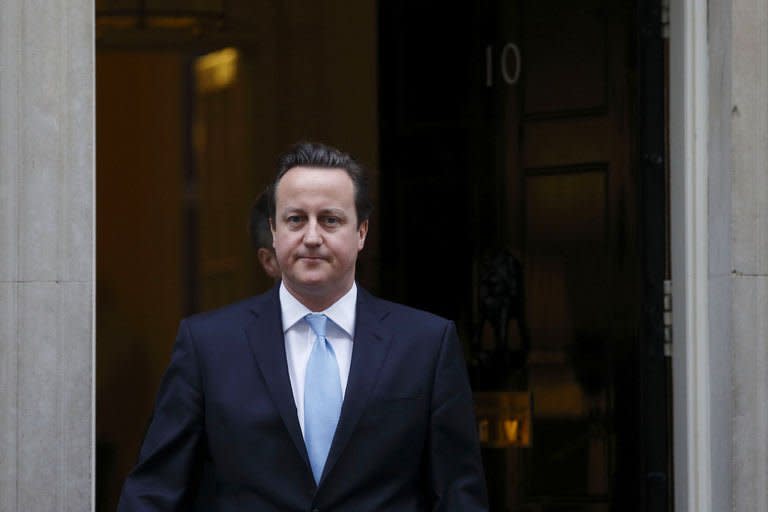 British Prime Minister David Cameron leaves Number 10 Downing Street in London on January 9, 2013. Cameron has denied trying to "blackmail" his European partners by threatening to pull out of the EU if he did not get his way on repatriating powers