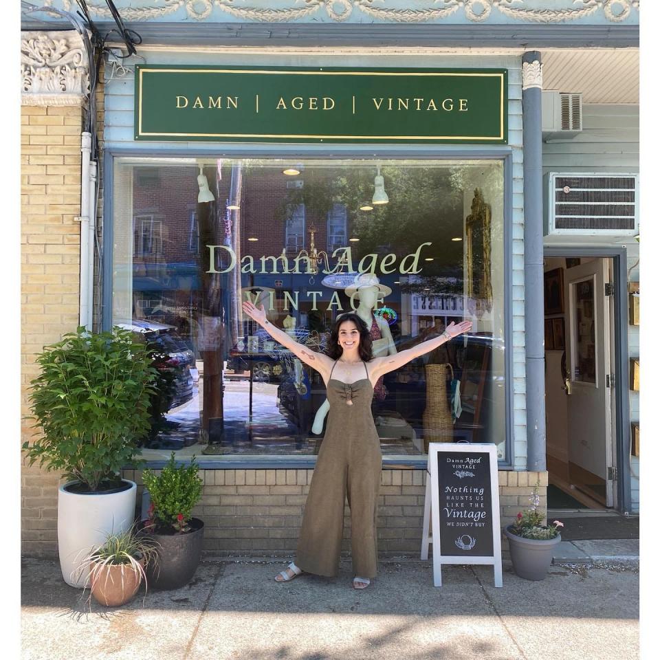 Judiann Romanello, owner of DamnAged Vintage in Cold Spring, New York, stands outside her store.
