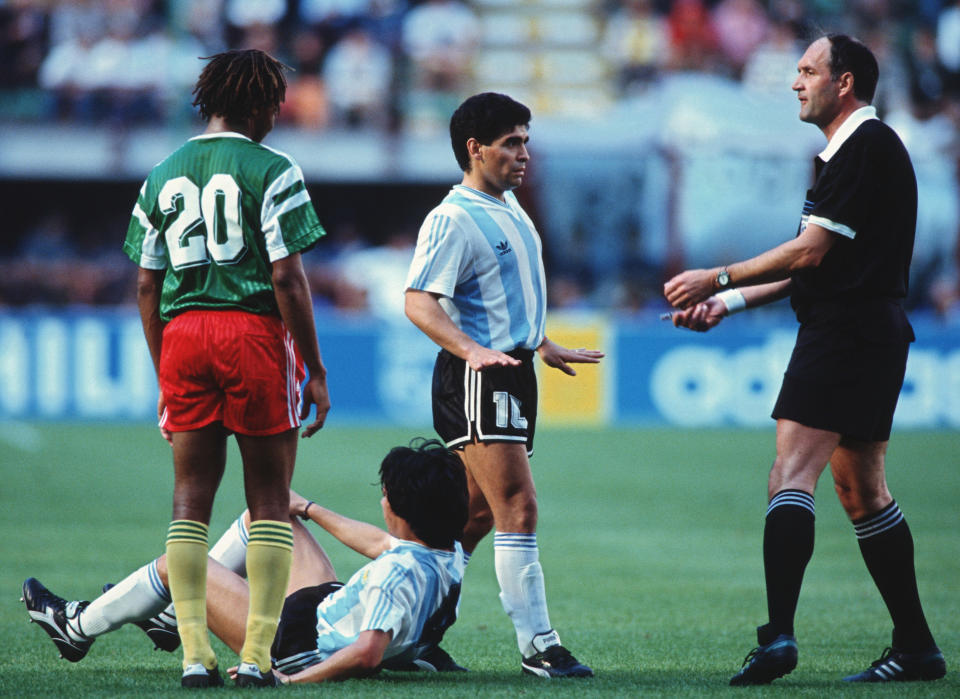 Referee Michel Vautrot of Sweden with Diego Maradona of Argentina