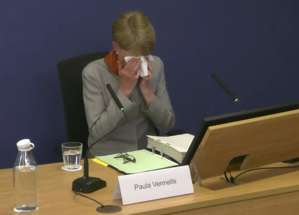 Screen grab taken from the Post Office Horizon IT Inquiry of former Post Office boss Paula Vennells becoming tearful for a second time whilst giving evidence to the inquiry at Aldwych House, as part of phases five and six of the probe, which is looking at governance, redress and how the Post Office and others responded to the scandal, in central London on Wednesday May 22, 2024. (Post Office Horizon IT Inquiry/PA via AP)