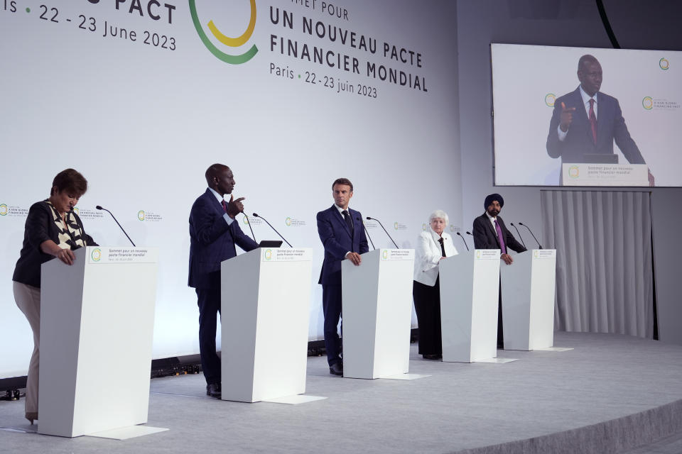 From the left, Kristalina Georgieva, President ff the International Monetary Fund, ,William Ruto, President of Kenya, French President Emmanuel Macron, U.S. Treasury Secretary Janet Yellen and World Bank President Ajay Banga attend a joint press conference at the end of the New Global Financial Pact Summit, Friday, June 23, 2023 in Paris.World leaders and finance bosses were set to release a "to-do list" to help developing countries better tackle climate change and poverty, a long-sought goal of the two-day summit in Paris that wraps up on Friday. (AP Photo/Lewis Joly, Pool)