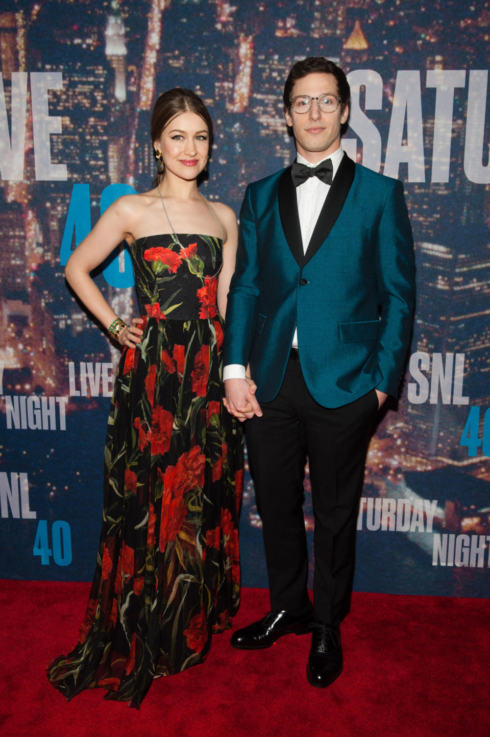 Andy Samberg, in a teal (the color of the night!) blazer, and his wife, Joanna Newsom, in a winter floral gown, take the top prize for best dressed couple on Sunday night. Even their color palates are perfectly coordinated!