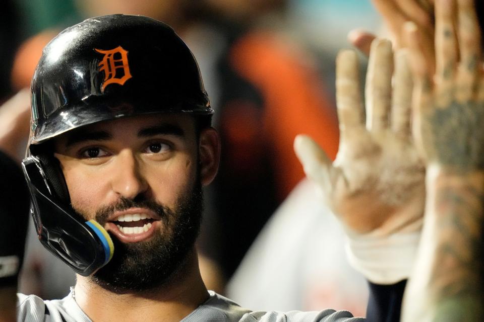 Detroit Tigers' Riley Greene celebrates in the dugout after scoring on a two-run double hit by Matt Vierling during the eighth inning of a baseball game against the Kansas City Royals at Kauffman Stadium in Kansas City, Missouri, on Monday, July 17, 2023.