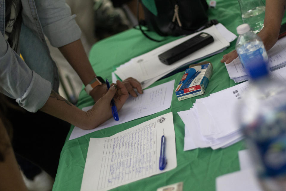 Signatures are collected to support the legalization of abortion on International Women's Day in Chihuahua, Mexico, Wednesday, March 8, 2023. Chihuahua is ruled by a conservative governor and its penal code criminalizes most abortions. (AP Photo/Adriana Esquivel)