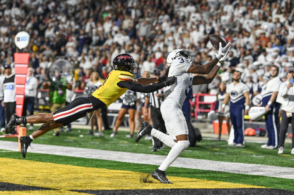 Nov 4, 2023; College Park, Maryland, USA; Penn State Nittany Lions wide receiver Dante Cephas (3) catches a pass in front of Maryland Terrapins defensive back Tarheeb Still (4) during the second half at SECU Stadium. Mandatory Credit: Tommy Gilligan-USA TODAY Sports