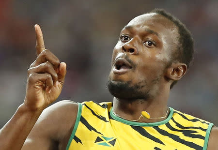 Usain Bolt of Jamaica reacts after winning the men's 200m final during the 15th IAAF World Championships at the National Stadium in Beijing, China August 27, 2015. REUTERS/Lucy Nicholson