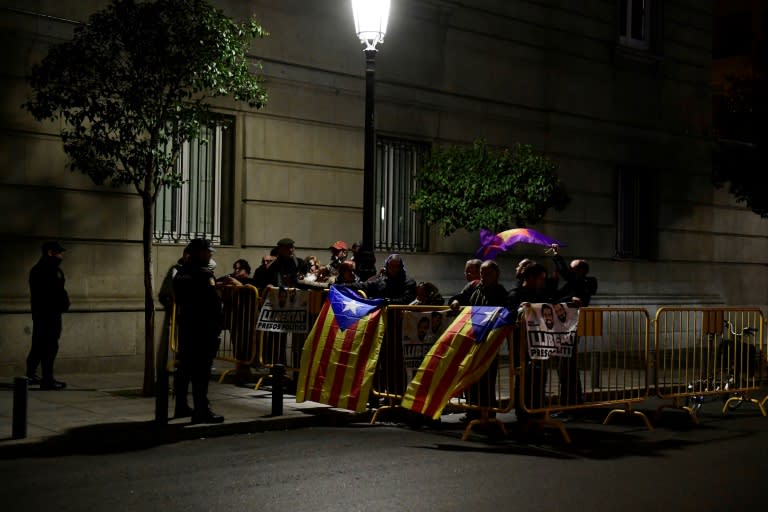 Protesters blocked roads and train lines across Catalonia on Wednesday, provoking commuter anger in a strike called by a pro-independence union over the arrests