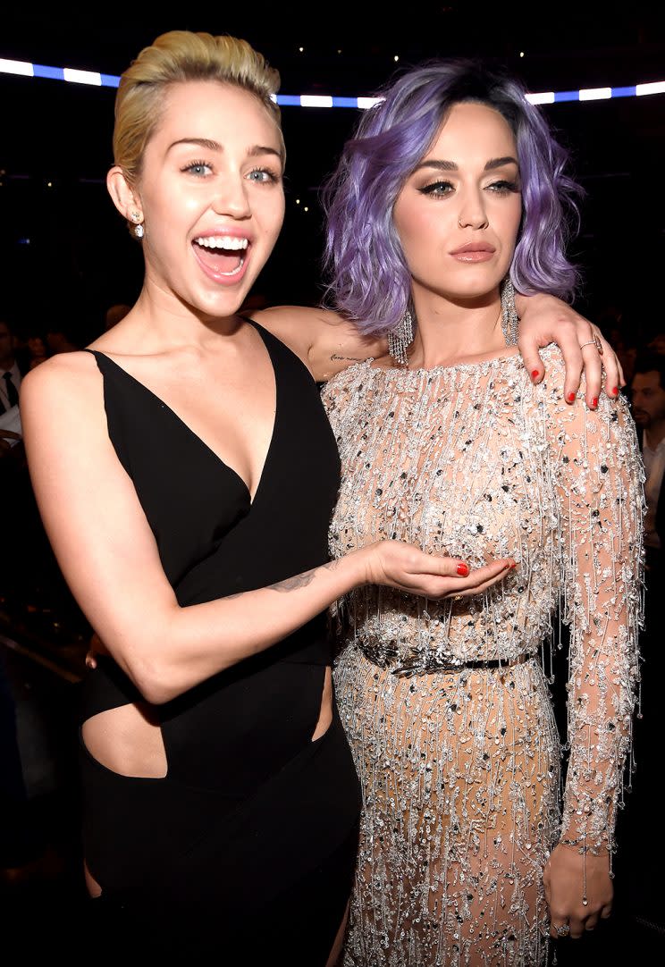 Miley Cyrus and Katy Perry at the 2015 Grammy Awards. (Photo: Kevin Mazur/WireImage)