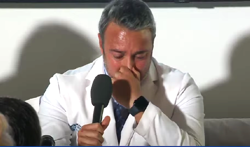 Leonardo V. Riella, medical director for kidney transplantation at Mass General Hospital, becomes emotional during a March 21 press conference following the successful transplant of a pig kidney into a patient with end-stage kidney disease.