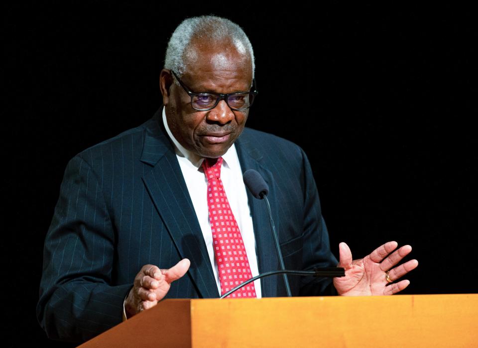 FILE - U.S. Supreme Court Associate Clarence Thomas speaks at the University of Notre Dame in South Bend, Ind., on Sept. 16, 2021. Thomas has been hospitalized because of an infection, the Supreme Court said Sunday, March 20, 2022. Thomas, 73, has been at Sibley Memorial Hospital in Washington, D.C., since Friday, March 18 after experiencing “flu-like symptoms,” the court said in a statement. (Robert Franklin/South Bend Tribune via AP, File) ORG XMIT: INSBE601