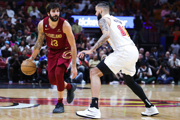 MIAMI, FLORIDA – MARCH 08: Ricky Rubio #13 of the Cleveland Cavaliers dribbles against Caleb Martin #16 of the Miami Heat during the second quarter of the game at Miami-Dade Arena on March 08, 2023 in Miami, Florida. NOTE TO USER: User expressly acknowledges and agrees that, by downloading and or using this photograph, User is consenting to the terms and conditions of the Getty Images License Agreement. (Photo by Megan Briggs/Getty Images)