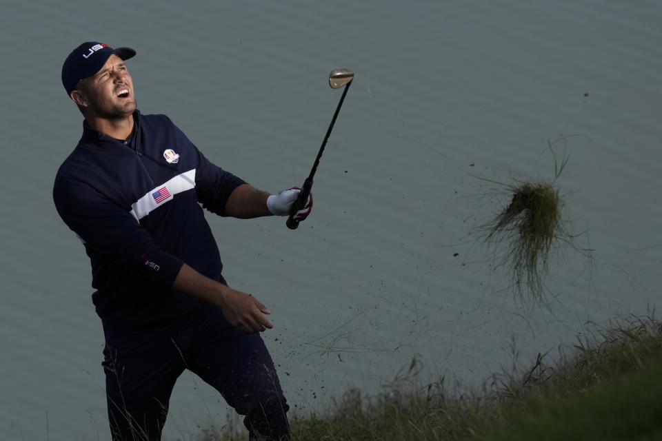 Team USA's Bryson DeChambeau hits to the 12th hole during a four-ball match the Ryder Cup at the Whistling Straits Golf Course Saturday, Sept. 25, 2021, in Sheboygan, Wis. (AP Photo/Ashley Landis)