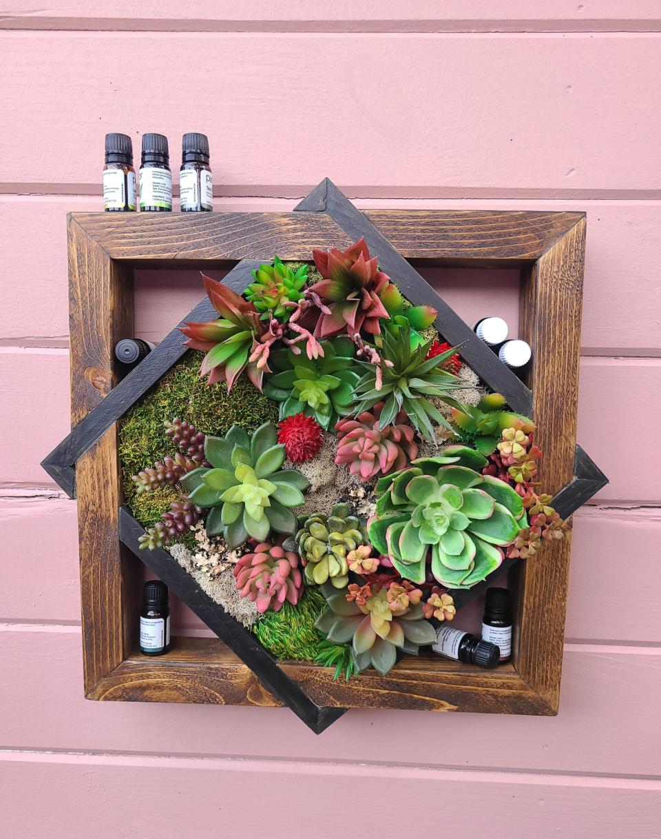 "Reflections: UNITY," a succulent vertical planter that doubles as storage for essential oils, by Rare Revivals, which also sells its pieces at a discount at Made in Warren, 476 Main St.