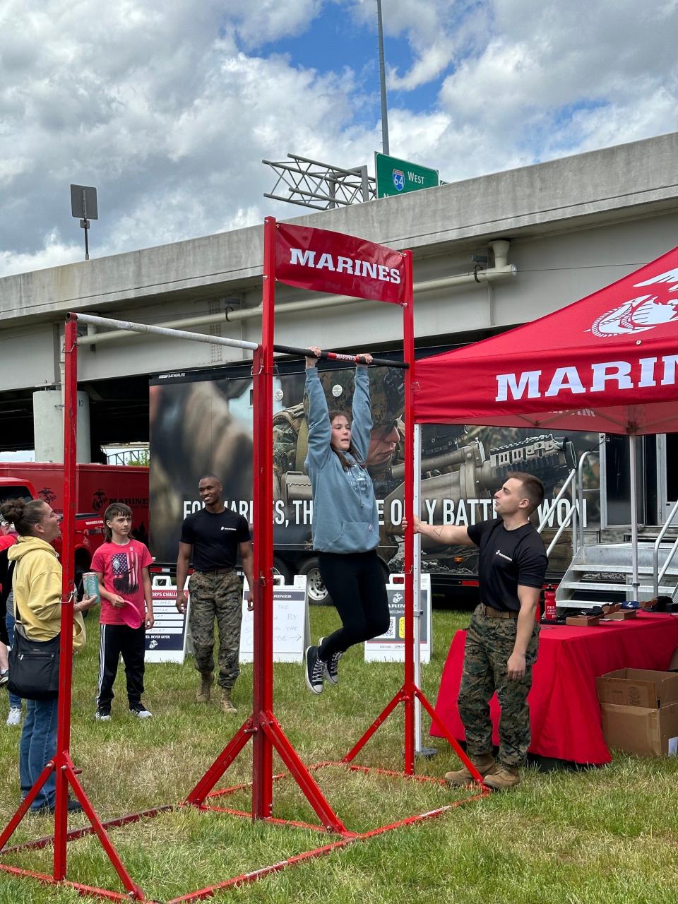 Grace Coleman, 14, and her family come to Thunder every year and bring their camper, parking it across the street from Waterfront Park. Her favorite part of Thunder, she said, are the different armed forces stations. She took on the pull-up challenge at the U.S. Marine Corps station.