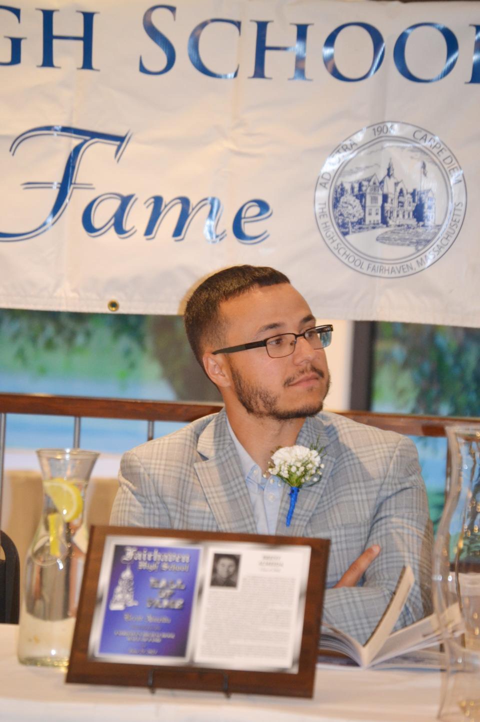 Brent Almeida listens as his Hall of Fame bio is read.