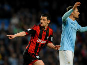 West Bromwich Albion's Graham Dorrans, left, celebrates scoring against Manchester City during their English Premier League soccer match at the Etihad Stadium, Manchester, England, Monday April 21, 2014. (AP Photo/Rui Vieira)