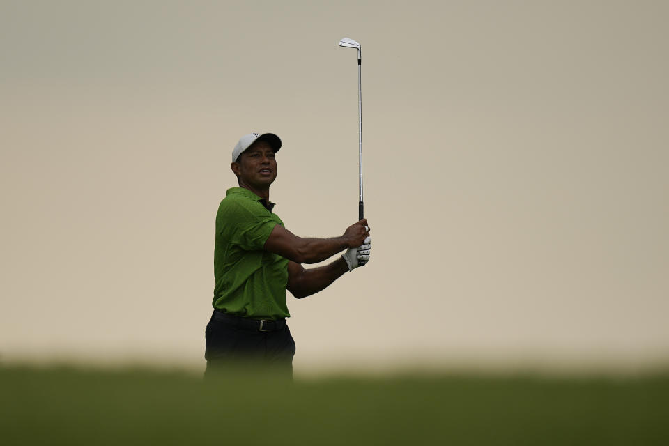 Tiger Woods hits from the fairway on the seventh hole during the second round of the PGA Championship golf tournament at Southern Hills Country Club, Friday, May 20, 2022, in Tulsa, Okla. (AP Photo/Eric Gay)