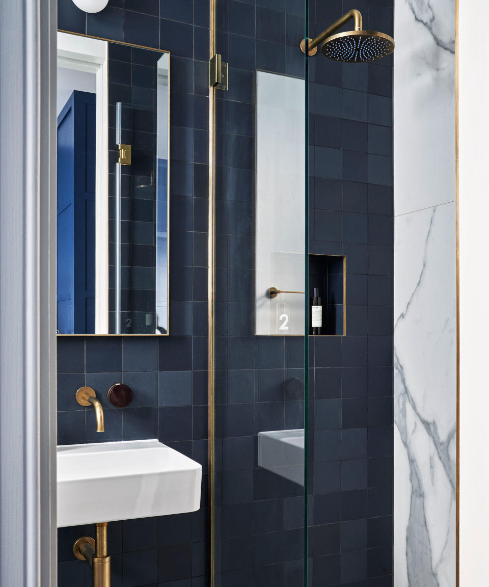 1. Reflect light and boost space with a mirrored cabinet