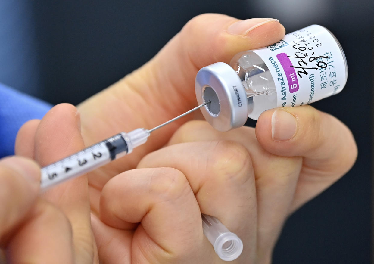 SEOUL, SOUTH KOREA - FEBRUARY 26: A nurse fills a syringe with the AstraZeneca Covid-19 vaccine at Dobong health care center on February 26, 2021 in Seoul, South Korea. South Korea started its Covid-19 coronavirus vaccination program today with AstraZeneca's vaccine for 785,000 medical workers and those who under the age of 65 at nursing homes. (Photo by Jung Yeon-Je-Pool/Getty Images)