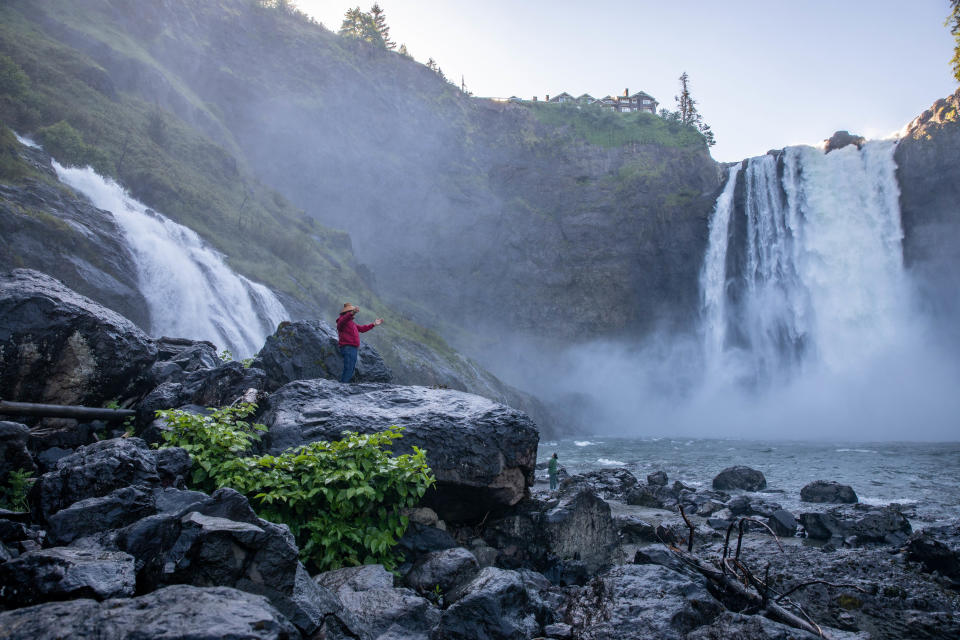 Snoqualmie tribal Chairman Robert de Los Angeles stands near Snoqualmie Falls in Washington, the most sacred site for the tribe and central to its history.