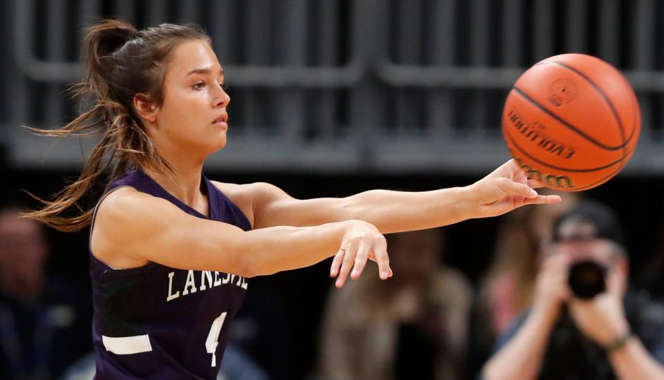 Lanesville Eagles guard Hadley Crosier (4) passes the ball during the IHSAA girls basketball Class 1A state championship against the Marquette Blazers, Saturday, Feb. 24, 2024, at Gainbridge Fieldhouse in Indianapolis. Lanesville Eagles won 51-43.