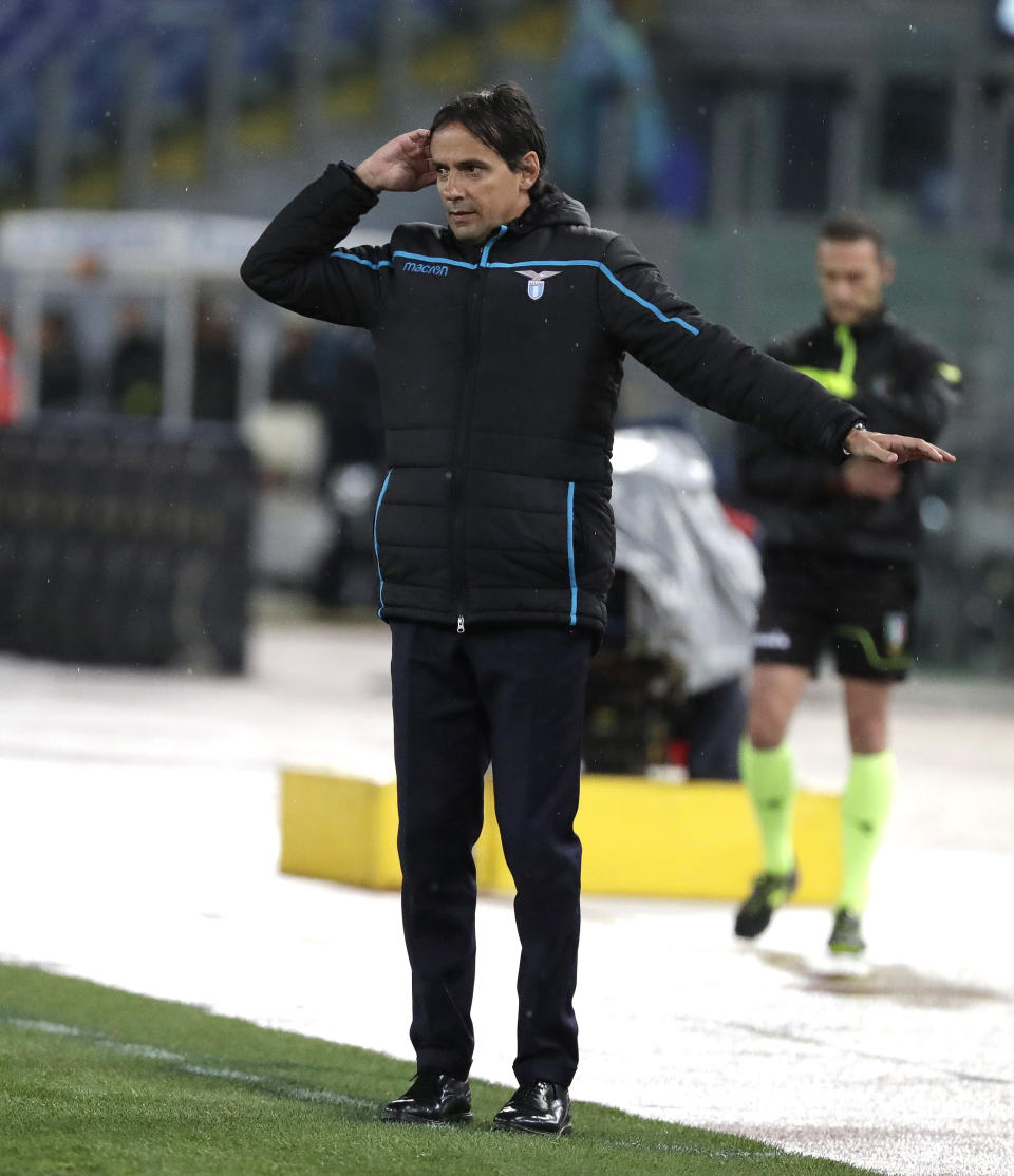 Lazio coach Simone Inzaghi gives directions to players during an Italian Serie A soccer match between Lazio and Bologna, at the Olympic stadium in Rome, Monday, May 20, 2019. (AP Photo/Andrew Medichini)