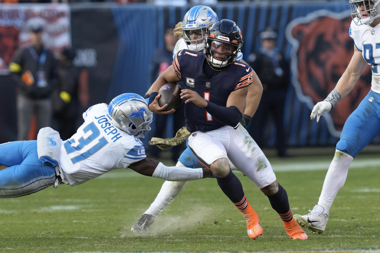 Justin Fields is still a work in progress as a passer, but his running ability has already made him a fantasy star. (AP Photo/Charles Rex Arbogast)