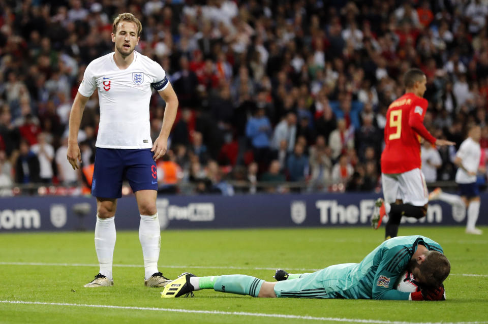 England's Harry Kane looks at Spain goalkeeper David de Gea on the ground after he stoped his shot during the UEFA Nations League soccer match between England and Spain at Wembley stadium in London, Saturday Sept. 8, 2018. (AP Photo/Frank Augstein)