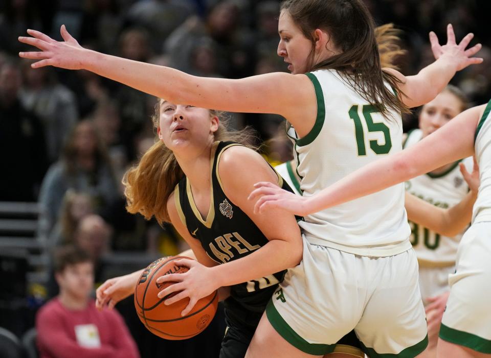 Lapel Bulldog Deannaya Haseman (10) tries to drive past Forest Park Ranger Amber Tretter (15) on Saturday, Feb. 25, 2023, during the IHSAA Class 2A championship game at Gainbridge Fieldhouse in Indianapolis.