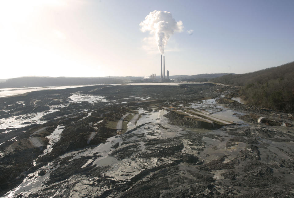 FILE - The aftermath of a retention pond wall collapse at the TVA Kingston Fossil Plant in Harriman, Tenn., is seen on Dec. 22, 2008. A coalition of environmental groups sued the Environmental Protection Agency on Thursday, Aug. 25, 2022, over its refusal to regulate some older coal ash dumps, claiming they are polluting air and groundwater. (AP Photo/Wade Payne, File)