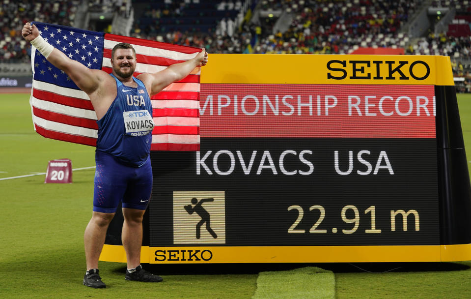 Joe Kovacs, of the United States, celebrates winning the championship record for gold in the men's shot put final at the World Athletics Championships in Doha, Qatar, Saturday, Oct. 5, 2019. (AP Photo/David J. Phillip)