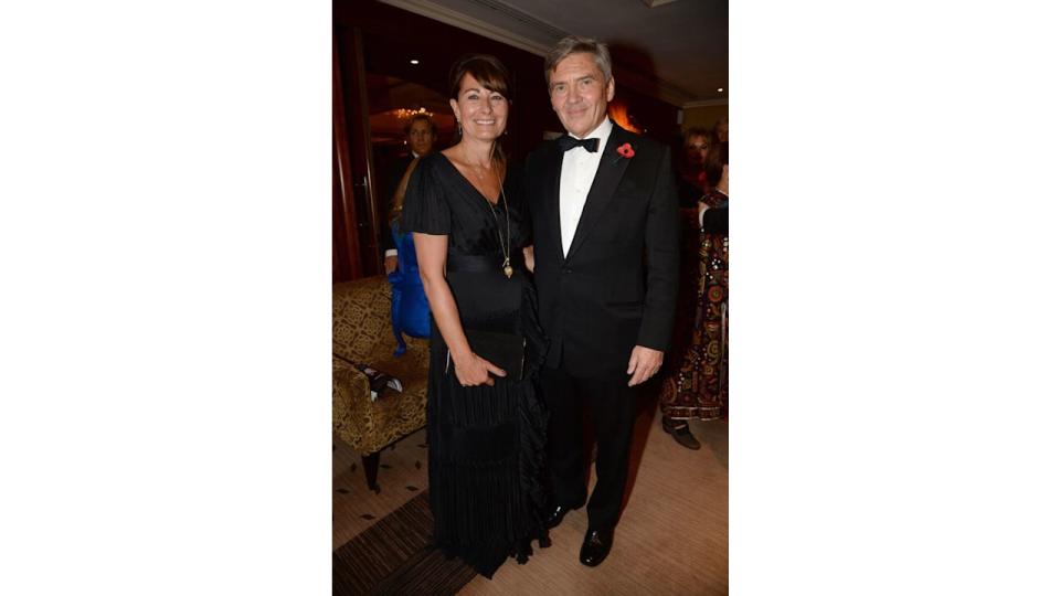 Carole Middleton in a black dress and Michael Middleton in a tuxedo