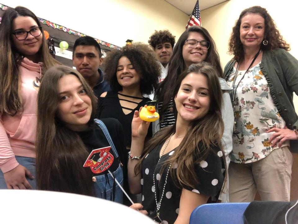 Alisar Alabdullah (bottom left) is shown in her Monroe High School English as a Second Language class. Standing on the far right is ESL teacher Kim Zimmerman.