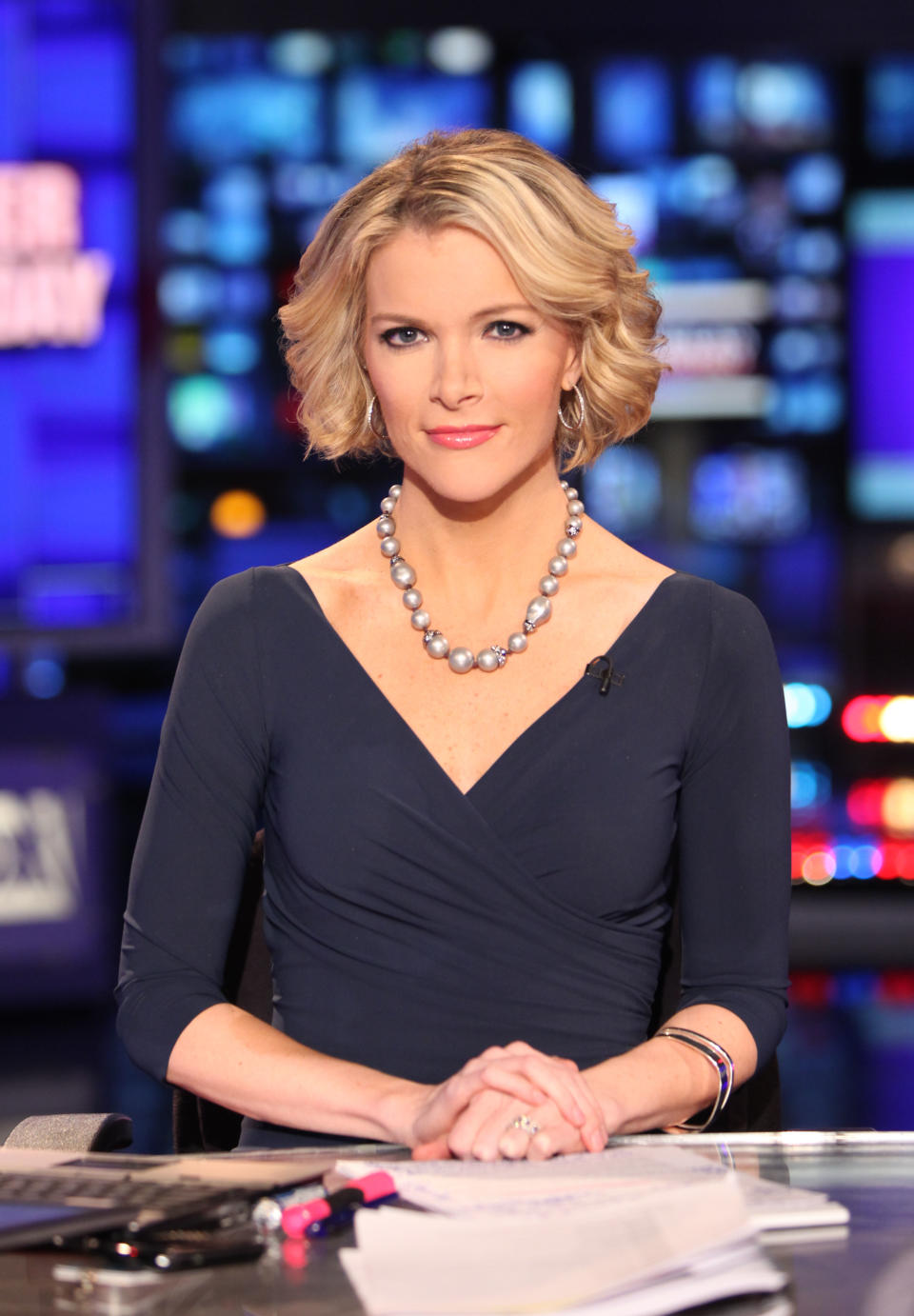 In this March 6, 2012 photo provided by Fox News, Fox News anchor Megyn Kelly is seated at the anchor desk at the Fox studios in New York. Starting Monday, Aug. 27, 2012, in Tampa, Fla., she'll be in Fox's booth as co-anchor with Bret Baier for the 2012 meetings. (AP Photo/Fox News, Alex Kroke)