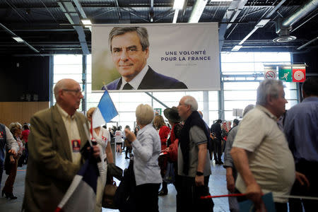 Supporters of French centre-right presidential candidate Francois Fillon arrive to attend a political rally in Paris, France, April 9, 2017. REUTERS/Benoit Tessier