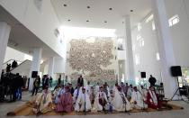 Musicians get ready to play a musical tribute in honour of the victims of the massacre of foreign tourists at Tunis' Bardo Museum, on March 29, 2015, in Tunis