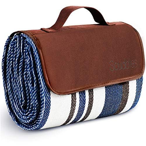 <p><strong>Scuddles</strong></p><p>amazon.com</p><p><strong>$23.19</strong></p><p><a href="https://www.amazon.com/Outdoor-Blanket-Water-Resistant-Waterproof-Sandproof/dp/B07QR6NK56?tag=syn-yahoo-20&ascsubtag=%5Bartid%7C2140.g.37200646%5Bsrc%7Cyahoo-us" rel="nofollow noopener" target="_blank" data-ylk="slk:Shop Now" class="link ">Shop Now</a></p><p>For the ultimate picnic setup, try buying your brother-in-law an extra large outdoor blanket, which comes equipped with waterproof foam padding for comfort. In addition to rolling up like a handbag, this blanket also has a zip-up pocket for stashing keys and a wallet. It's perfect for camping, too.</p>