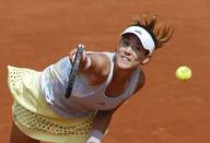 Garbine Muguruza returns a shot. French Open - Roland Garros - Myrtille Georges of France v Garbine Muguruza of Spain - Paris, France - 25/05/16. REUTERS/Jacky Naegelen