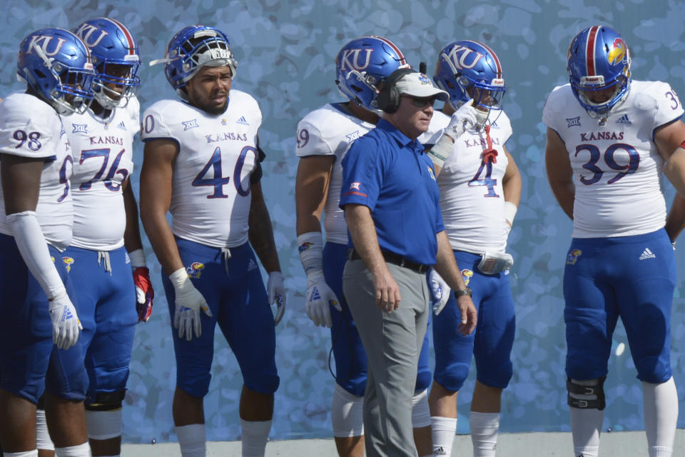 Kansas coach David Beaty watches during the second half of an NCAA college football game against West Virginia in Morgantown, W. Va., Saturday Oct. 6, 2018. (AP Photo/Craig Hudson)