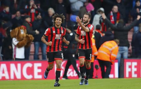 Football Soccer Britain - AFC Bournemouth v Liverpool - Premier League - Vitality Stadium - 4/12/16 Bournemouth's Nathan Ake celebrates scoring their fourth goal with Steve Cook Reuters / Eddie Keogh Livepic