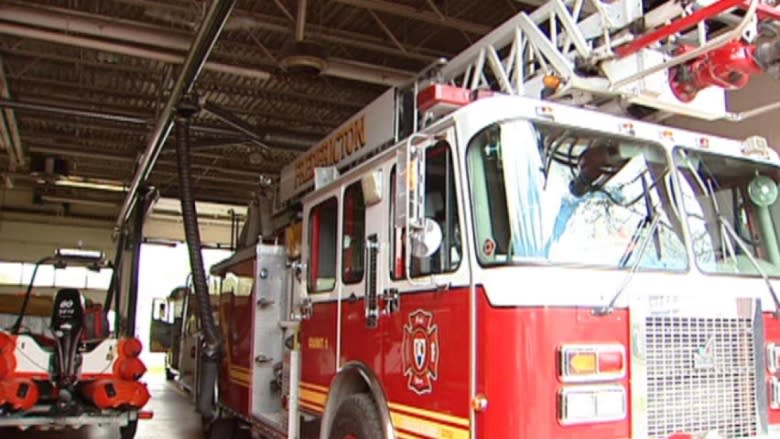 Man rescued from 2nd-storey window as fire rips through Fredericton home