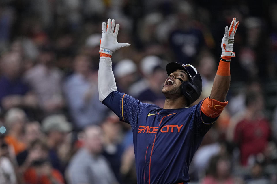 Houston Astros' Jeremy Pena celebrates after hitting a solo home run during the second inning of a baseball game against the Toronto Blue Jays, Monday, April 1, 2024, in Houston. (AP Photo/Kevin M. Cox)