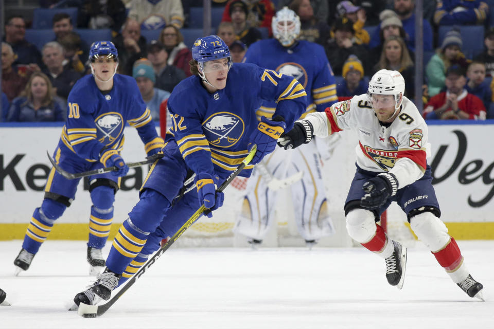 Buffalo Sabres center Tage Thompson skates against Florida Panthers center Sam Bennett (9) during the first period of an NHL hockey game, Monday, Jan. 16, 2023, in Buffalo, N.Y. (AP Photo/Joshua Bessex)