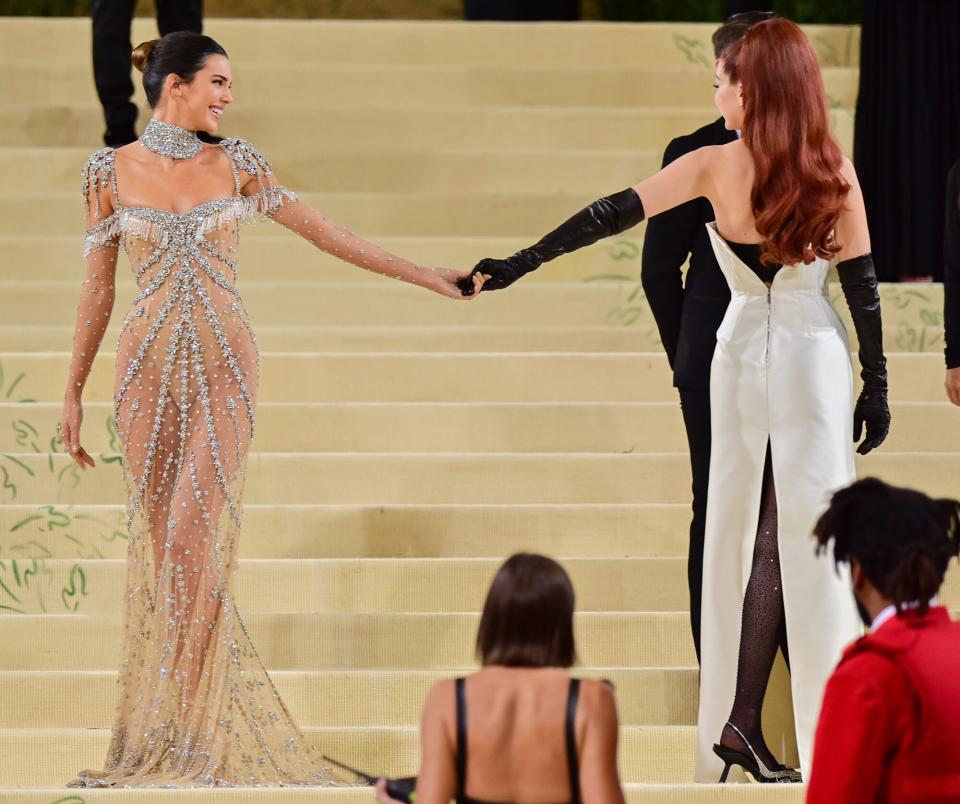 Kendall Jenner and Gigi Hadid arrive to the 2021 Met Gala Celebrating In America: A Lexicon Of Fashion at Metropolitan Museum of Art on September 13, 2021 in New York City