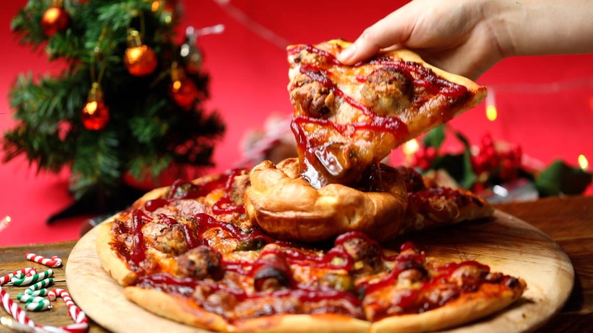 Christmas dinner pizza with a gravy-filled Yorkshire pudding