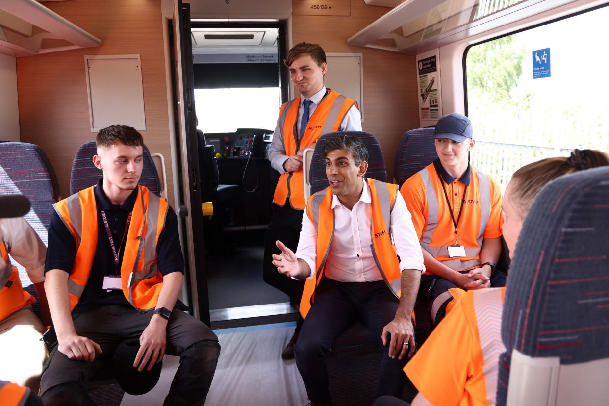 Prime Minister and Conservative Party leader Rishi Sunak speaks to apprentices inside a new train during a visit to Alstom Transport (Getty Images)